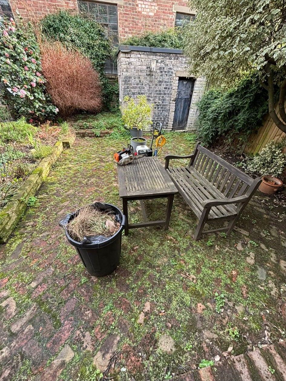 Worn lawn before new turf